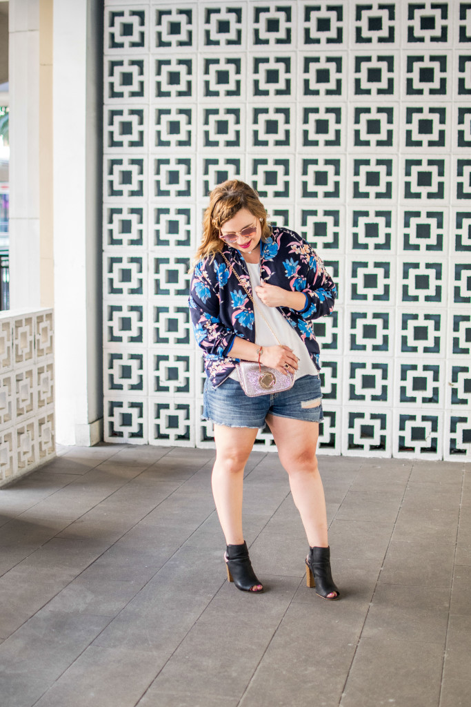 Distressed shorts, layered chokers and a floralbomber jacket for the win! 